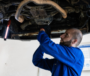 Man working underneath the car | Silver Spring, MD